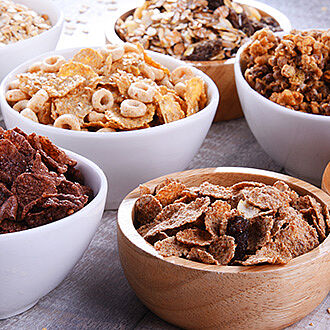 Bowls with cereals, granola, and grains