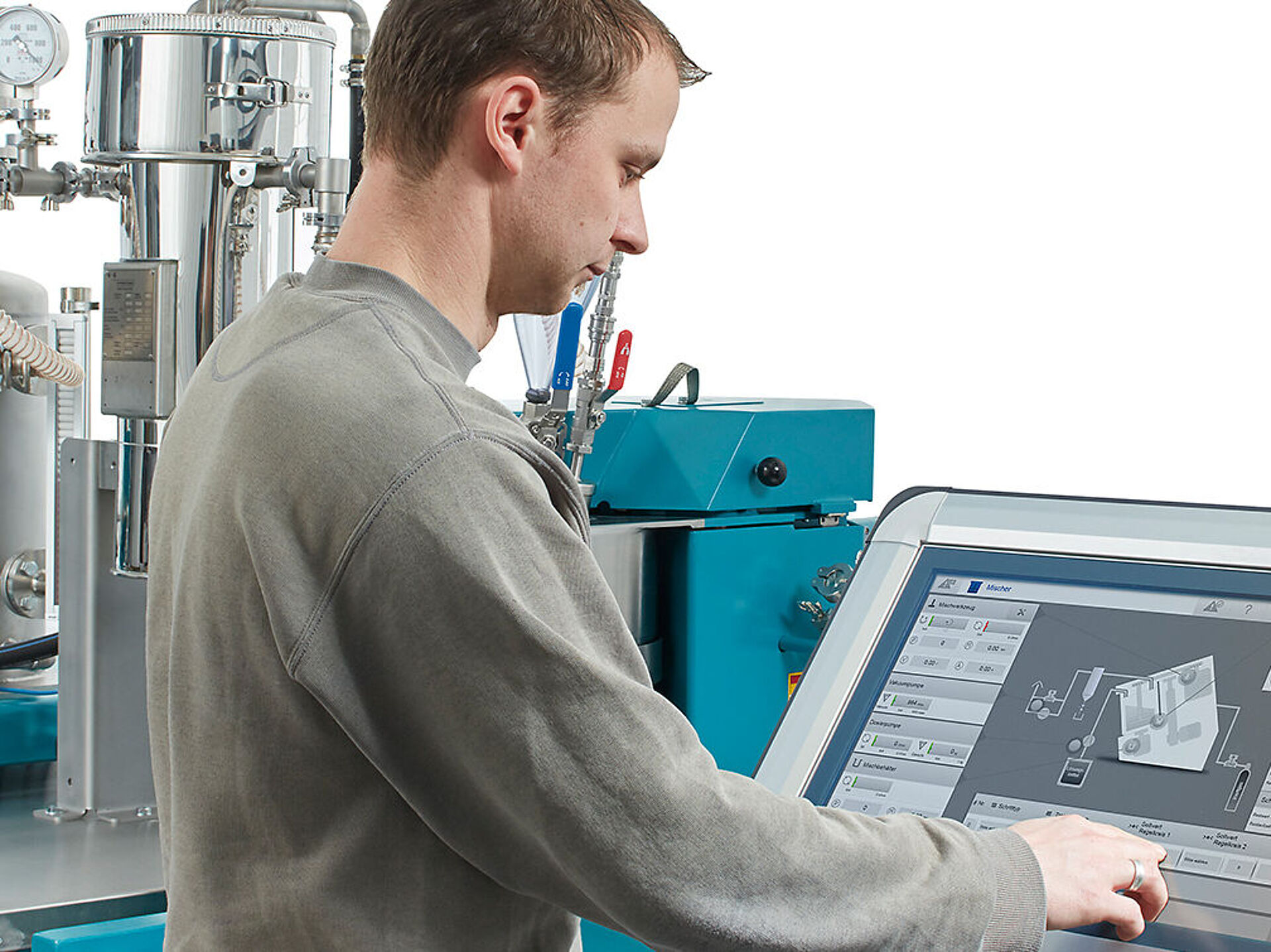 Operator using EIRICH control panel